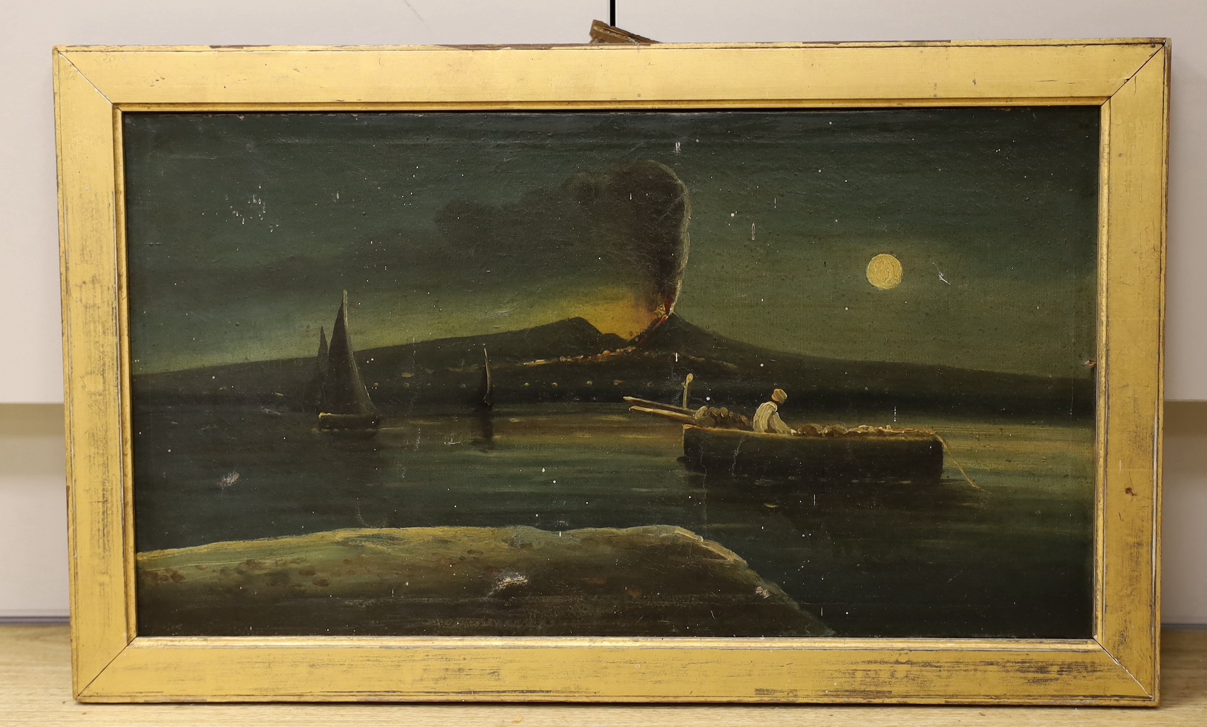 19th century Neapolitan School, oil on canvas, Bay of Naples at night with Vesuvius erupting, 28 x 51cm